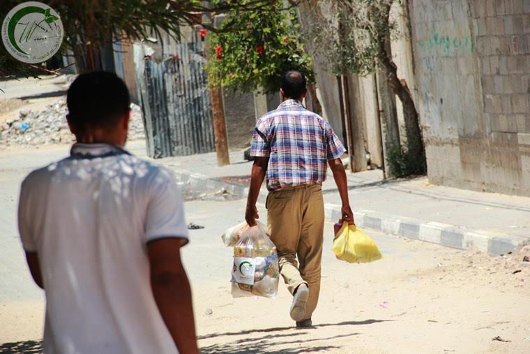 "الوئام" تنفذ مشروع توزيع السلّة الرمضانية صورة توضيحية
