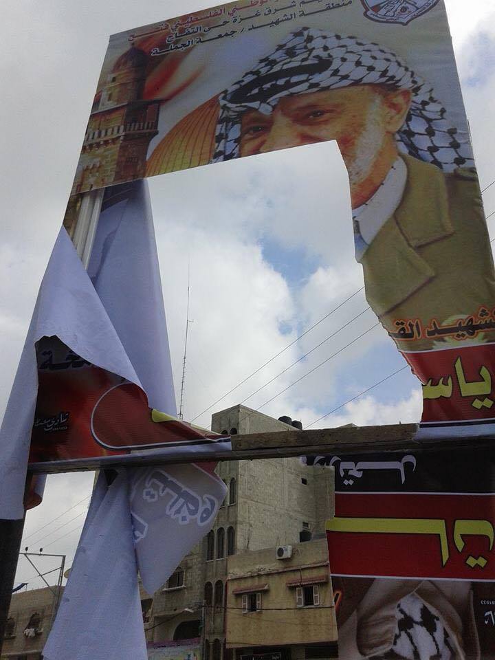 اعتداءات على عناصر من فتح وتمزيق لصور عرفات في غزة فتح