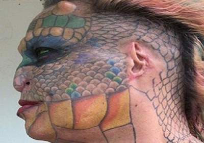 متحولة جنسياً تجري عمليات تجميل لتصبح “تنيناً”