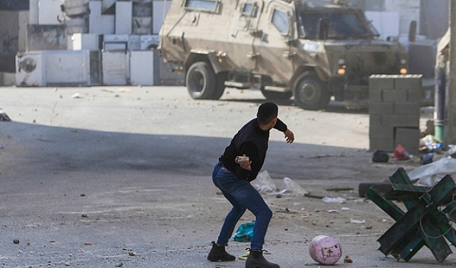 اعتقالات بالضفة والقدس واشتباكات في جنين