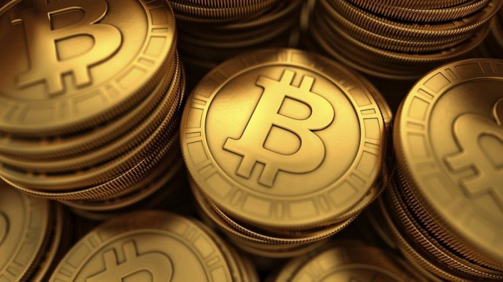 "بتكوين" تتجاوز 60 ألف $ في أعلى مستوى خلال 6 أشهر