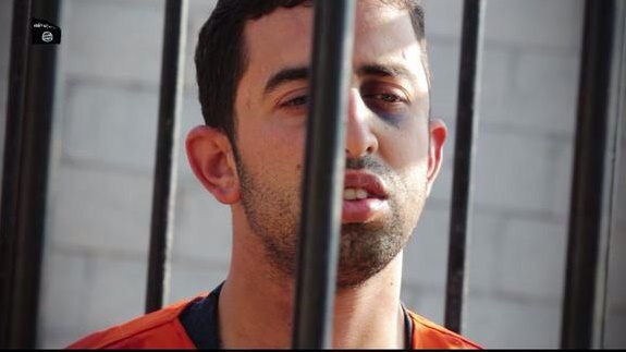 بالصور: داعش تعدم الطيار الأردني حرقًا الكساسبة