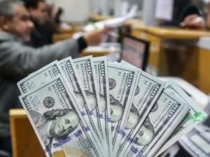 معاريف: اتفاق ينهي قضية منحة رواتب موظفي غزة