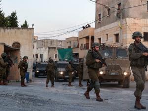 اشتباكات في جنين واعتقالات بالضفة والقدس
