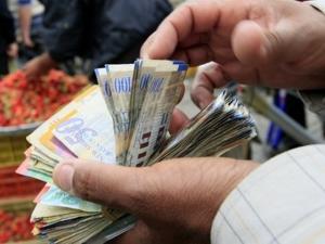 صرف العملات مقابل الشيكل