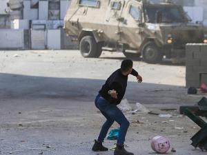 اعتقالات بالضفة والقدس واشتباكات في جنين