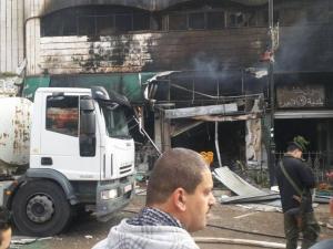 الاحتلال يقتحم محل صرافة برام الله ويخلّف حريقًا ضخمًا