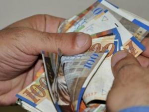 التنمية: صرف 700 شيكل لـ 68 ألف أسرة بالضفة وغزة