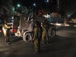 اشتباكات بجنين ومداهمات لمنازل قيادات بحماس